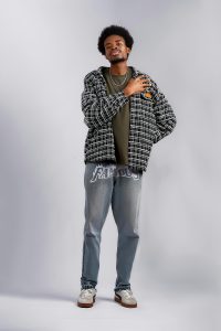 Handsome African Male Model, afro hair, jacket, blue jeans